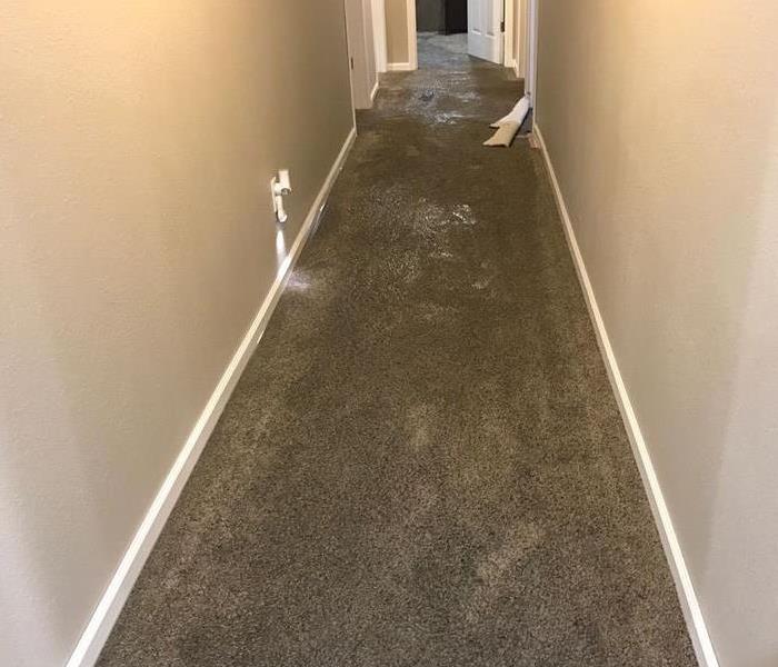 Water loss hallway before mitigation